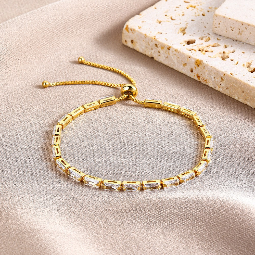 Zlatý tenisový náramok „Horizen“