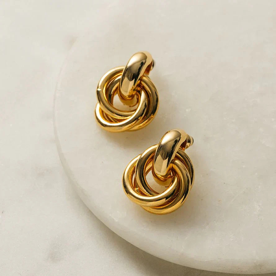 Išskirtiniai interlocking auskarai | Baltas auksinis